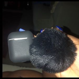 AirPod charging case with pom Pom keychain